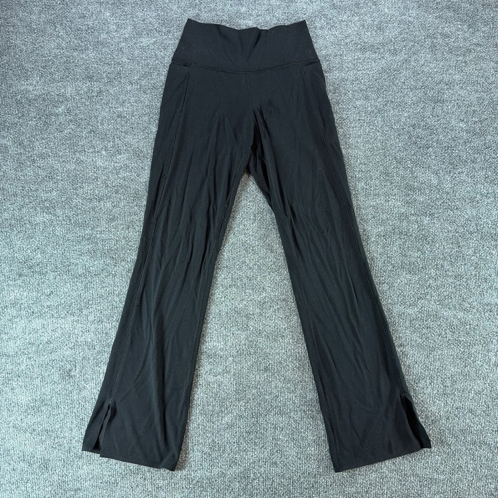 Athleta Womens High Rise Flared Yoga Pants Black Side Pockets Slit Hem Small Gym